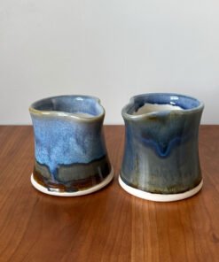 modern cream pitcher in two different glazes