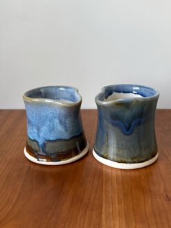 modern cream pitcher in two different glazes