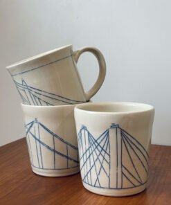 Wheel thrown pottery mugs with bridge motif