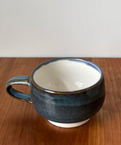Pottery Tea Cup with Blue speckled exterior and white interior