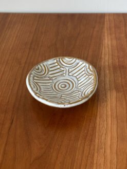 Handmade Pottery Bowl with a interlocking circular stamped pattern