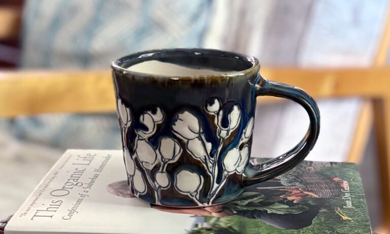 handmade pottery mug in living room