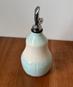 pottery olive oil bottle with blue glaze