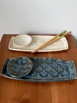 handmade pottery sushi set in cream and blue glaze