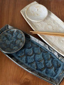 handmade pottery sushi set in cream and blue glaze