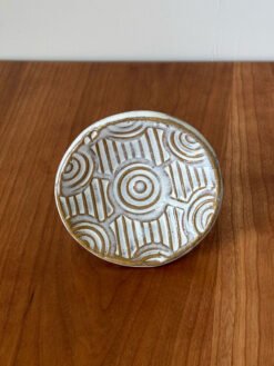 Handmade Pottery Bowl with a interlocking circular stamped pattern