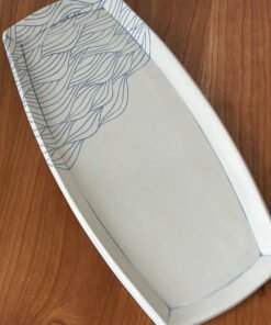 small pottery platter with wave pattern