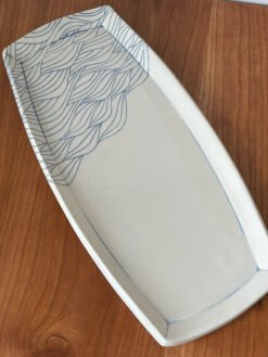 small pottery platter with wave pattern