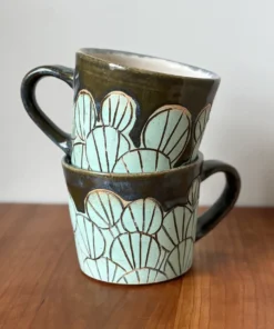 pottery mug with lily pad pattern